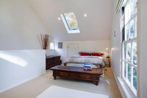 Llit o llits en una habitació de White Cottage