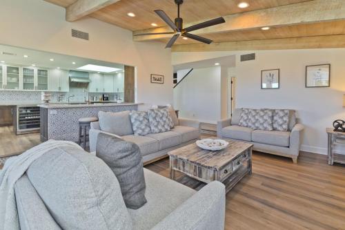 a living room with a couch and a table at Big Horn Desert Estate Luxury Smarthome - Amazing Pool & Game Room! in Palm Desert