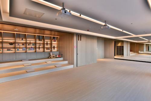 a room with a dance floor and a wine cellar at Four Points by Sheraton Taipei Bali in Bali