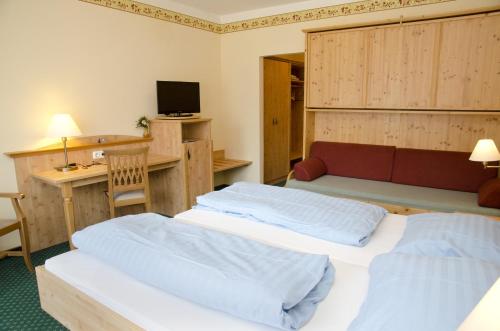 Cama o camas de una habitación en Landgasthof Hausmann