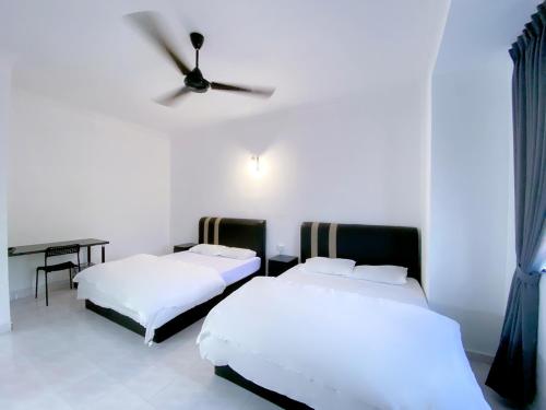 Katil atau katil-katil dalam bilik di Venice Guest Hostel - Bilik Sahaja