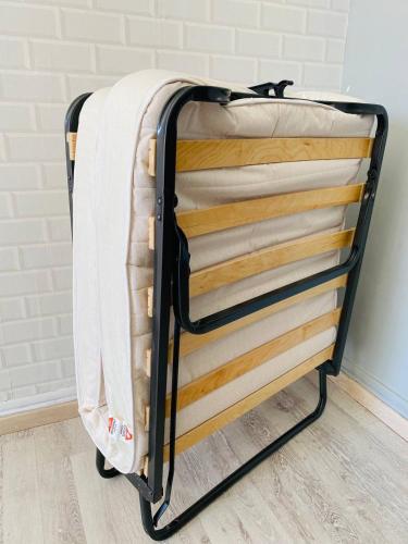 a towel rack with towels on it in a room at RIVIERA STUDIO CANNES CENTER in Cannes