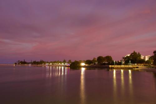 a view of the water at night at RIVERVIEWS@THECOSMOPOLITAN UNIT20805 in Maroochydore