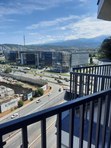 a view of a highway from a balcony at Жк Metropole 2х комнатная in Almaty