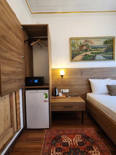 Кухня или мини-кухня в Kadıköy White House
