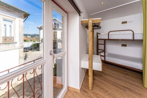Katil atau katil-katil dalam bilik di Olá Vida - Hostel Caminha