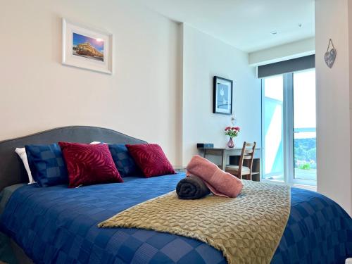 Giường trong phòng chung tại Sweet Home Apartment North Melbourne