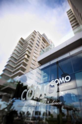 a close up of a building with a cisco sign on it at Olympic Residence Deluxe Apartments in Limassol