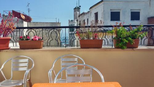 Rõdu või terrass majutusasutuses Hotel Maram