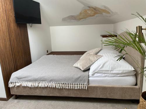 Postel nebo postele na pokoji v ubytování Hotel Jaśmin