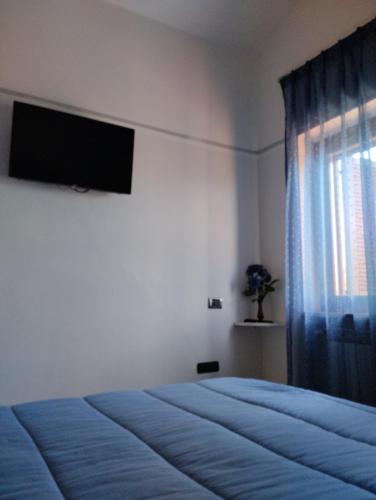TV a/nebo společenská místnost v ubytování B&B Angolo Verde