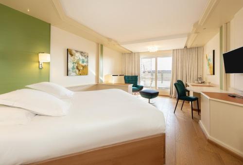 Postel nebo postele na pokoji v ubytování La Clairière bio & spahotel