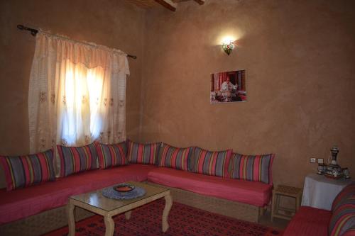 Posezení v ubytování Maison d'hotes la tour de toile