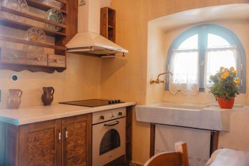 Virtuvė arba virtuvėlė apgyvendinimo įstaigoje Kythera secrets suites