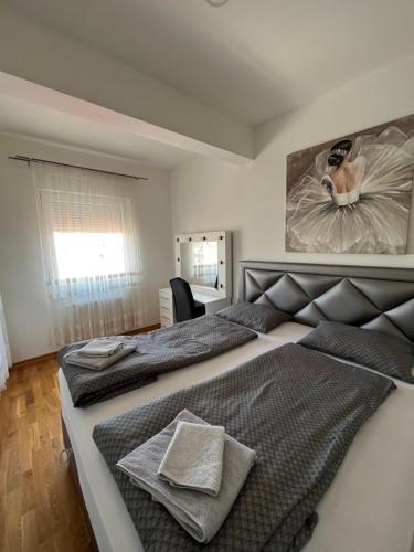 Ένα ή περισσότερα κρεβάτια σε δωμάτιο στο APARTMAN MASA