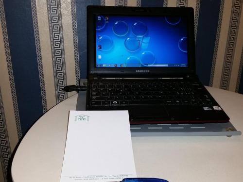 a laptop computer sitting on top of a table at Hotel Teti in Rome