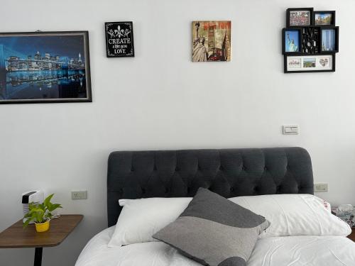 Cama o camas de una habitación en 七星天使-七星潭電梯民宿