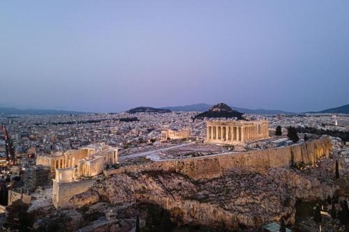 an aerial view of the ancient city of antiquity at Acropolis Select in Athens
