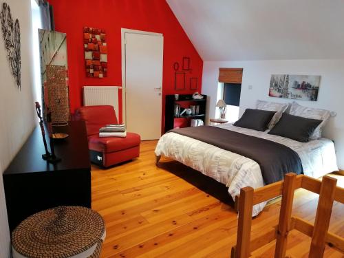 Postel nebo postele na pokoji v ubytování Chambre d'hôte Les Volets Bleus