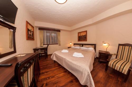 Postel nebo postele na pokoji v ubytování Hotel Stanica Kresowa Chreptiów