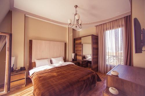 Postel nebo postele na pokoji v ubytování Royal Venezia Hotel