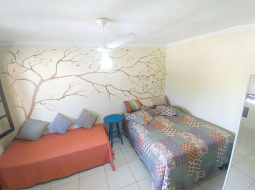 Tempat tidur dalam kamar di Condomínio encantador com piscina em Itaúna