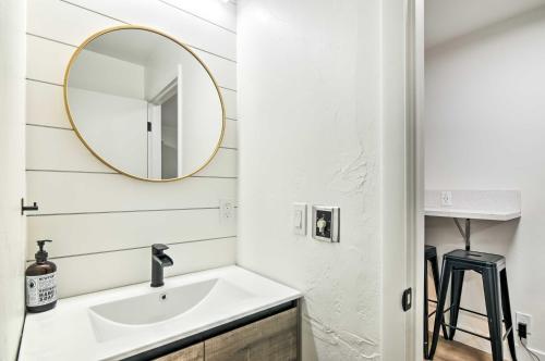 a bathroom with a sink and a mirror at The Cottages Ski-InandOut Retreat - Hike and Explore! in Beaver