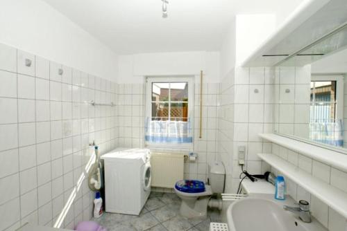 Koupelna v ubytování Ferienhaus Deichläufer Norddeich