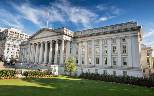 a large white building with a lawn in front of it at Hotel Washington in Washington