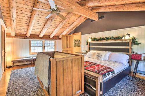 a bedroom with a bed with a wooden ceiling at Accord Vacation Rental with Pool and Hot Tub! in Accord
