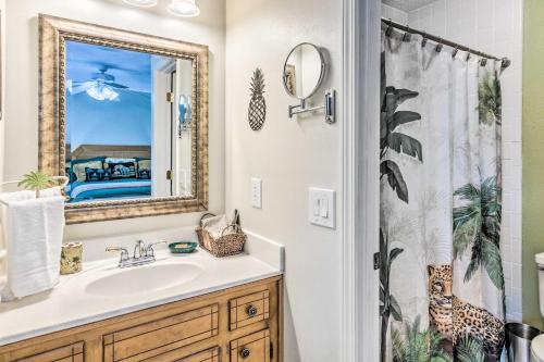 a bathroom with a sink and a shower with a mirror at Gulf Breeze Vacation Rental 5 Mi to Beach! in Gulf Breeze