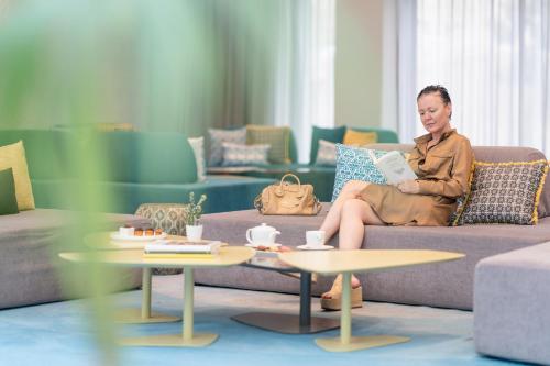 Coin salon dans l'établissement Vichy Thermalia Spa Hôtel