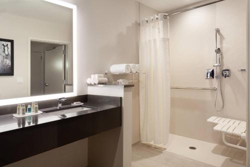a bathroom with a sink and a shower at Fairfield Inn & Suites by Marriott Wellington-West Palm Beach in Wellington