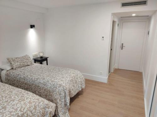 Ένα ή περισσότερα κρεβάτια σε δωμάτιο στο Hotel - Hostel Atuvera