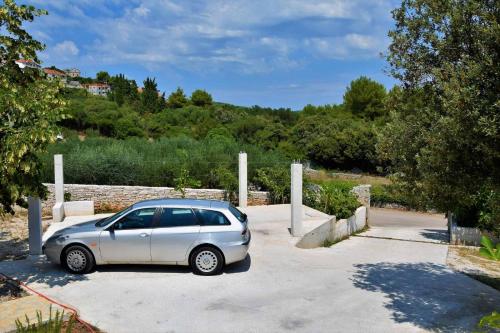 a silver car parked in a parking lot at Villa Adriana in Selca