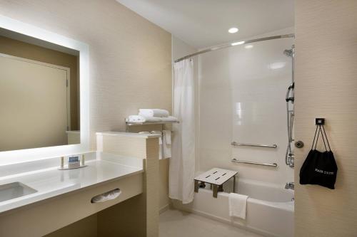 a bathroom with a sink and a shower and a toilet at Fairfield Inn & Suites by Marriott Rock Hill in Rock Hill