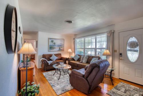 a living room with a couch and a table at Home Away from Home Daytona 3 Bedroom in South Daytona