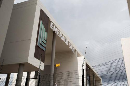 a building with a sign on the side of it at Secured and Fully equipped apartment- E in Lombardy East