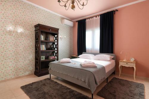 Postel nebo postele na pokoji v ubytování Villa - 1st Floor