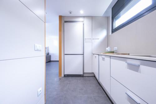 Kuchyňa alebo kuchynka v ubytovaní NC APARTMENTS Moli Blau 102 - 4 personas