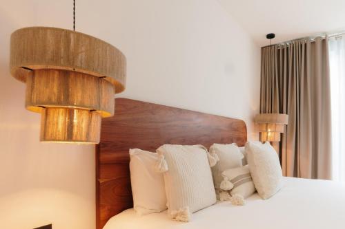 Letto o letti in una camera di Majagua Hotel Boutique -Adults Only