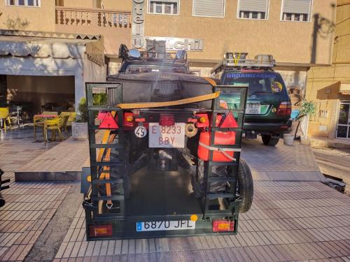 a car is parked in a parking lot at Hôtel Imilchil in Midelt