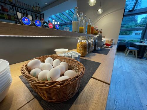 a basket of eggs on the counter of a bar at Hotel Spatz in Lucerne