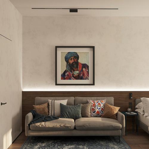 a couch in a living room with a painting of a man at Blueloft 47 l studio with balcony Tashkent City Center in Tashkent