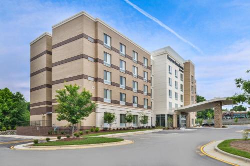 a rendering of the front of a building at Fairfield Inn & Suites by Marriott Raleigh Cary in Cary