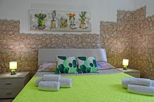 Ένα ή περισσότερα κρεβάτια σε δωμάτιο στο Ficu Pala Holiday Home