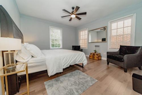 a bedroom with a bed and a ceiling fan at Comfortable King Suite Zen Space in Hattiesburg