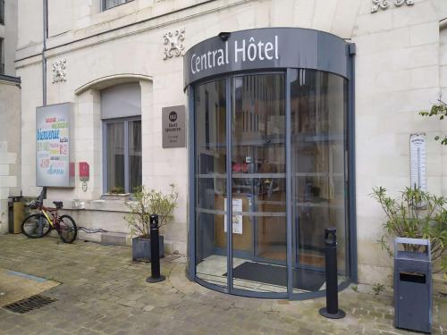 a phone booth in front of a building at Best Western Central Hotel in Tours