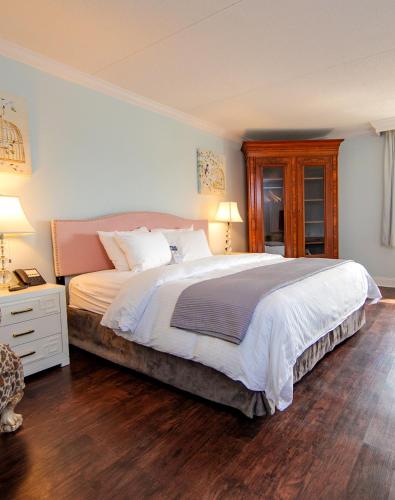 Un ou plusieurs lits dans un hébergement de l'établissement Bella Vista Hotel & Suites