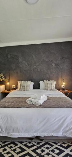Ένα ή περισσότερα κρεβάτια σε δωμάτιο στο Bo Kamer Guesthouse